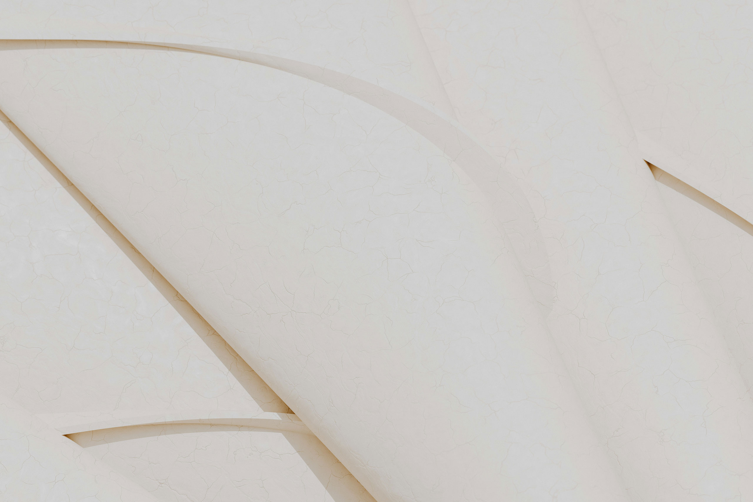 Close-up of rounded beige concrete fasade with subtle cracks